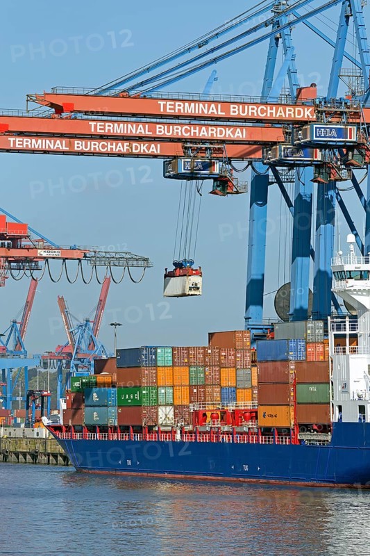 Containers are loaded onto cargo ship