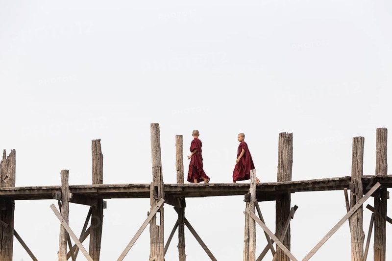 Monks crossing U Bein bridge