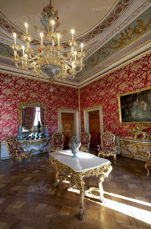 Hall with historical furniture and chandeliers