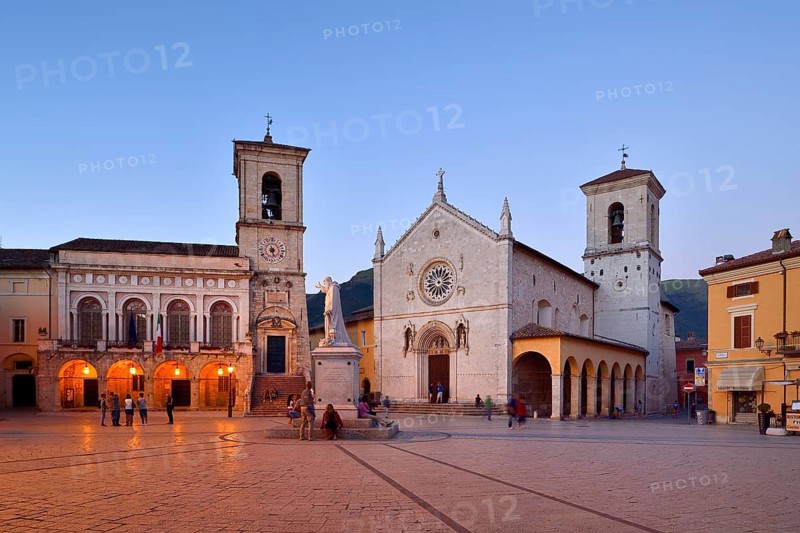 Palazzo Comunale Town Hall and Basilica di San Benedetto at twilight