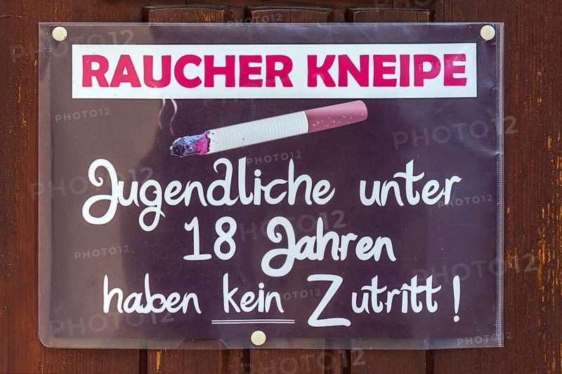 Sign for smoker pub at the entrance door