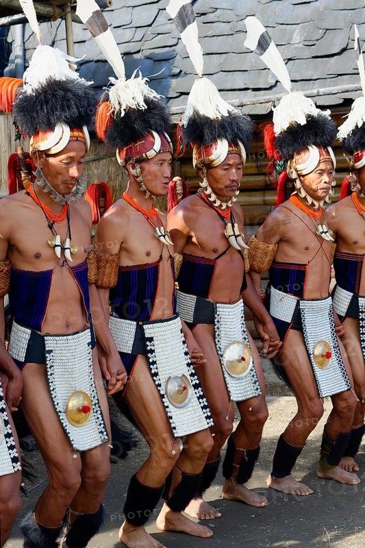 Naga tribal men in traditional clothing performing ritual dances