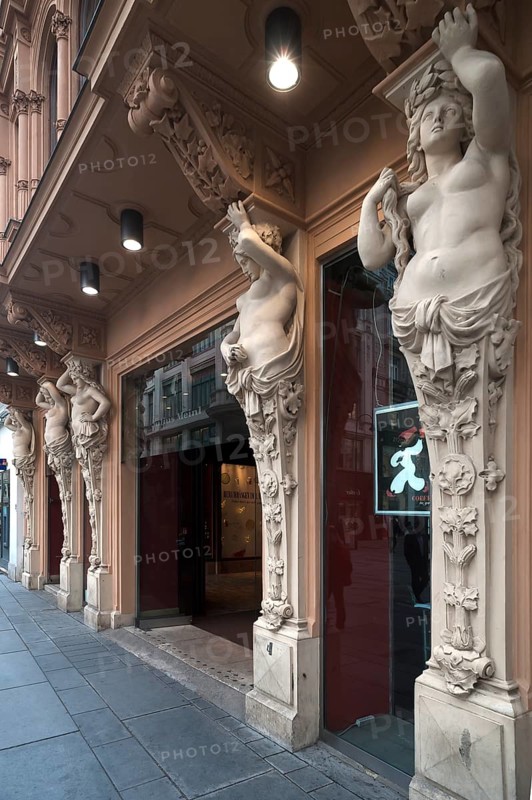Caryatids on building front