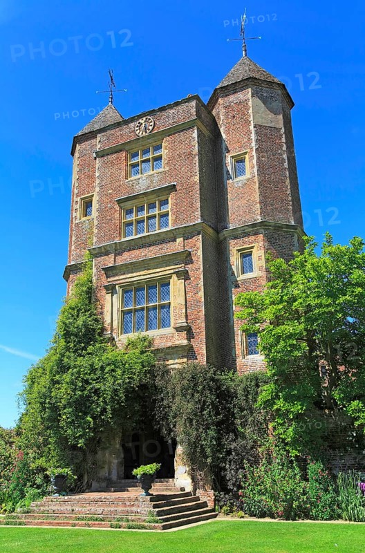 Red brick tower and blue sky