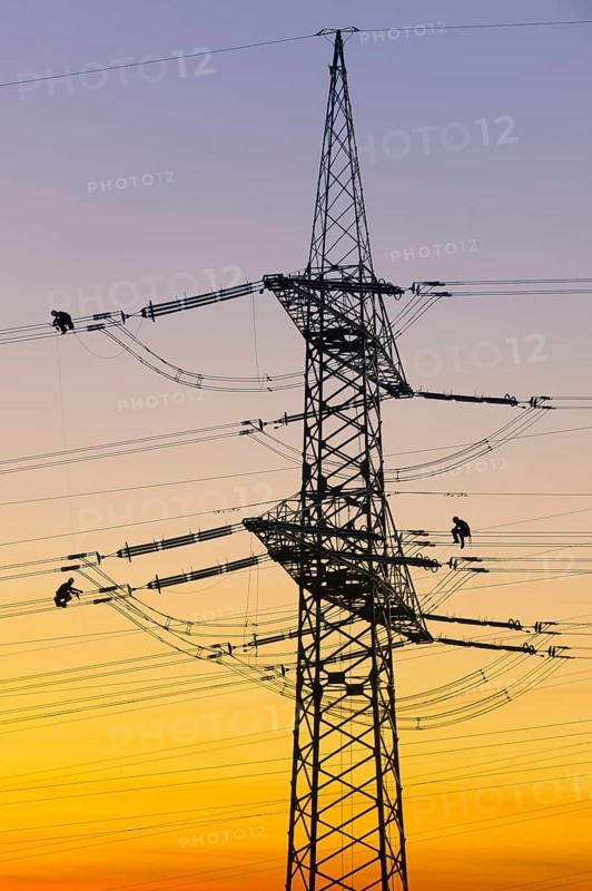 High-voltage engineers at work