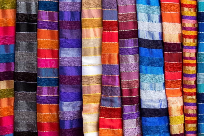 Colorful striped cloths for sale at the street stall