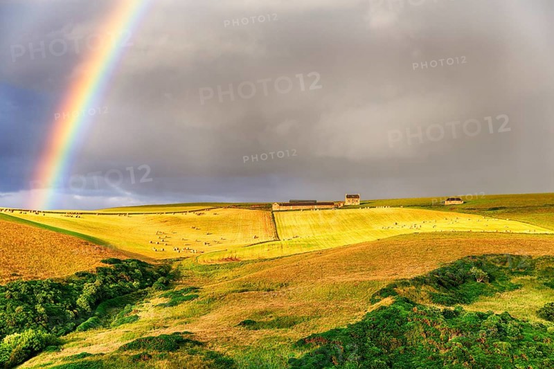 Agricultural landscape with rainbow
