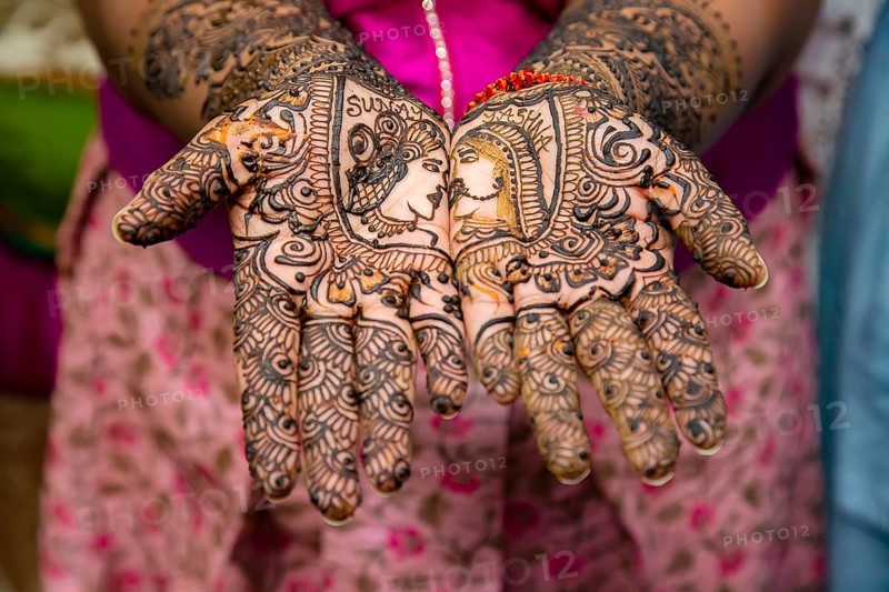 Close up of mehendi on bride's hand