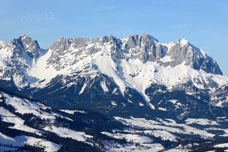 Snow-covered mountain massif Wilder Kaiser in winter with Ellmauer Tor