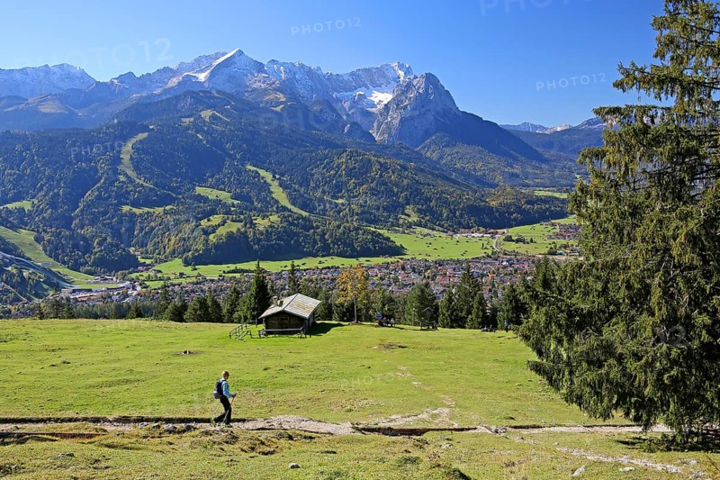 Eckenhutte am Wank with view on the village and the Wetterstein range with Alpspitze 2628m and Zugspitze 2962m