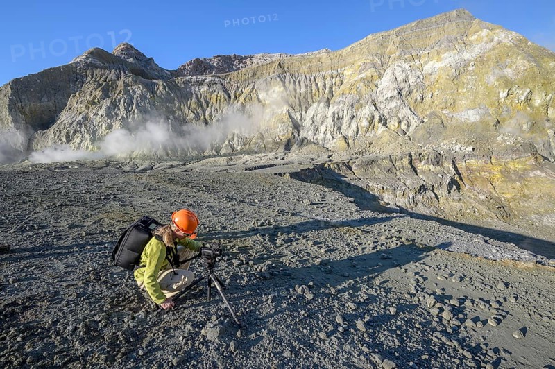 Camerawoman on the volcanic island White Island