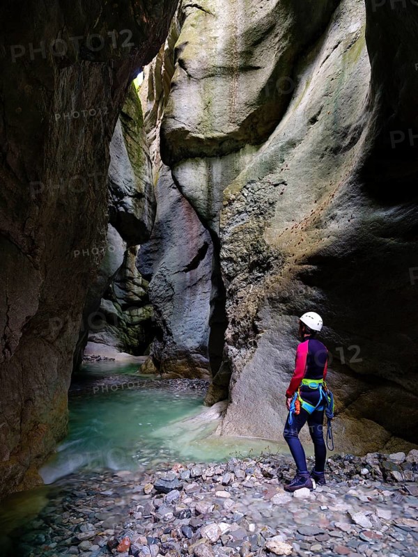 Woman canyoning in the Tauglbach Gorge