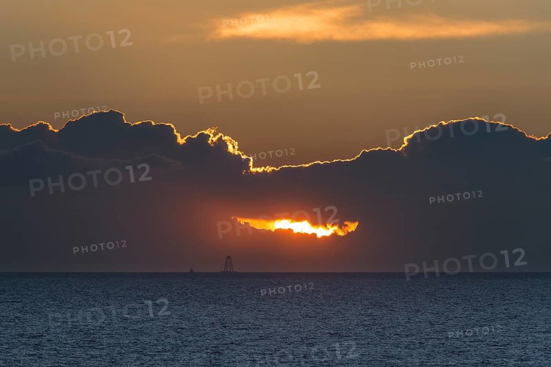 Sunset with dark clouds over the Baltic Sea