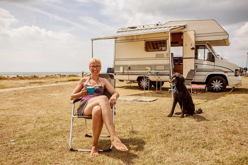 Woman sitting with a dog