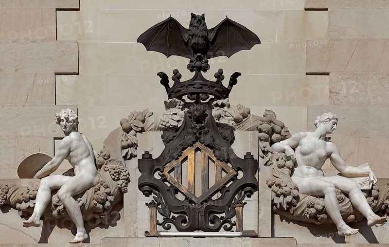 City coat of arms with bat and female figures by Mariano Benlliure