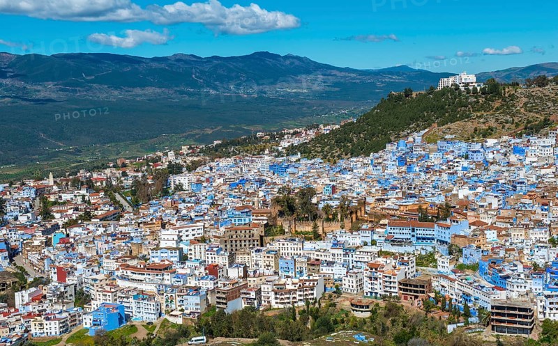 View on blue houses of the medina of Chefchaouen with Kasbah