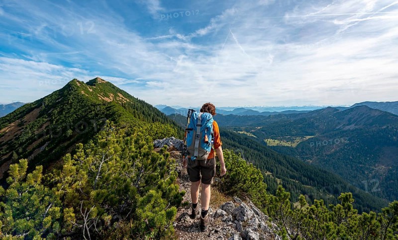 Hiker crossing the Blauberge