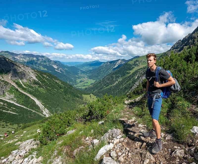 Hiker on the hiking trail from Hinterstein to Schrecksee