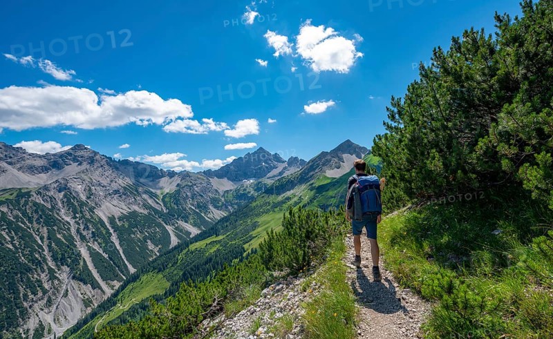 Hiker on hiking trail Jubilaumsweg
