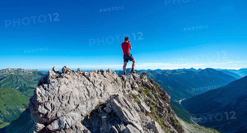 Hiker photographing