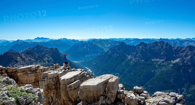 Hiker standing on rocks