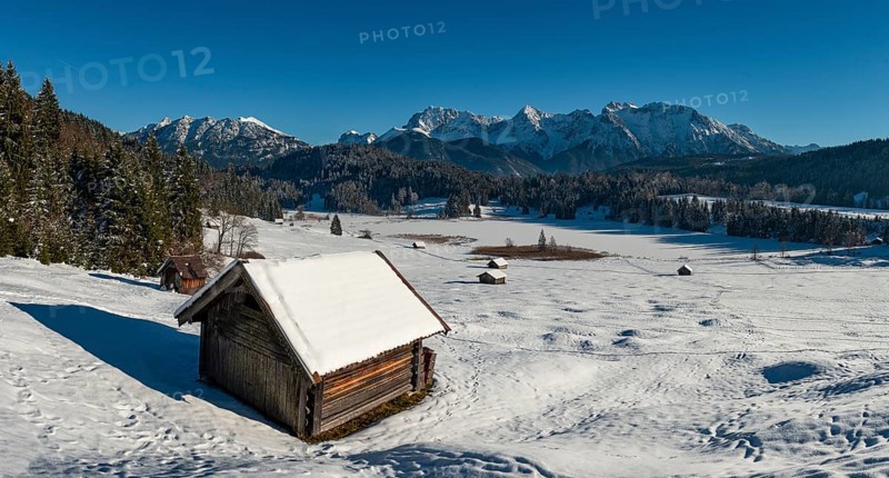 Haystack in snow-covered landscape