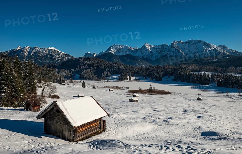 Haystack in snow-covered landscape