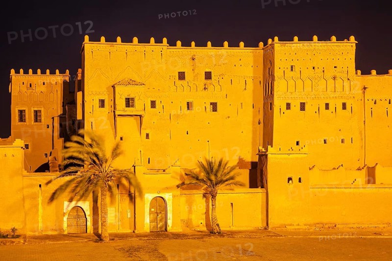 Illuminated Kasbah Taourirt at night