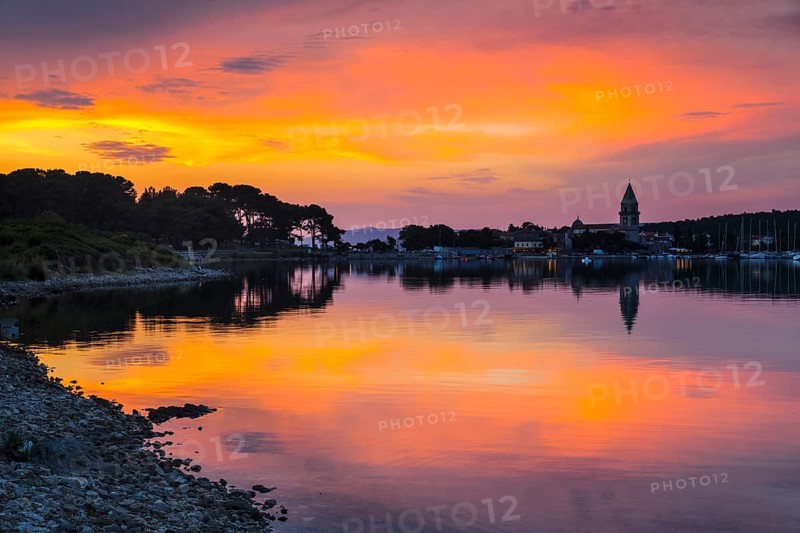 View of Osor on Losinj Island by the Kavada Channel at sunset