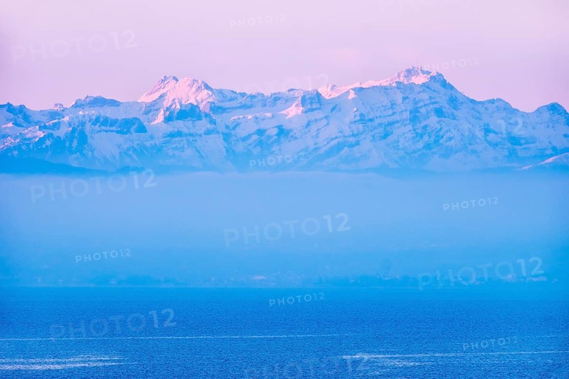 Lake with mountains Altmann and Santis in Switzerland