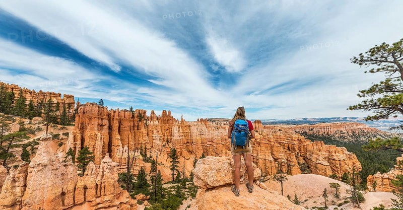Hiker with backpack in bizarre landscape