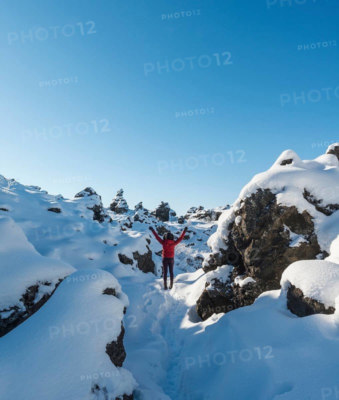 Woman with arms in the air