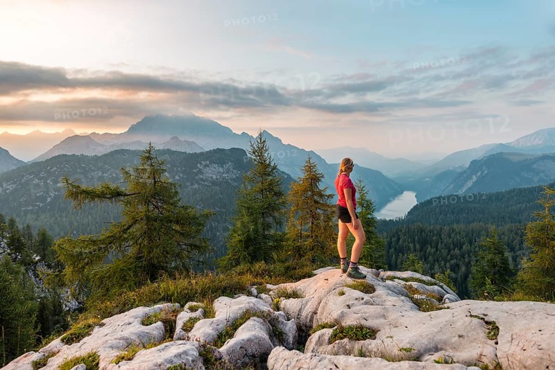 Hiker looks at mountain panorama