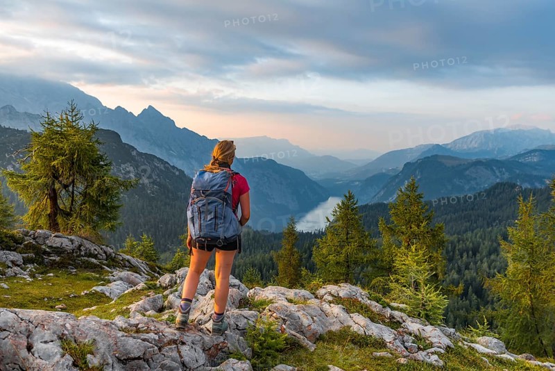 Hiker looks at mountain panorama