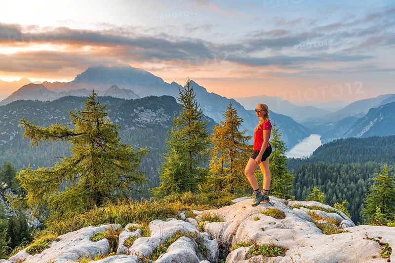Hiker looks at mountain panorama