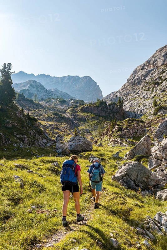 Two hikers on one hiking trail
