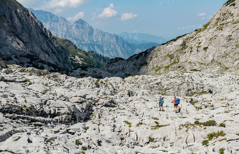 Hiker crosses rocks
