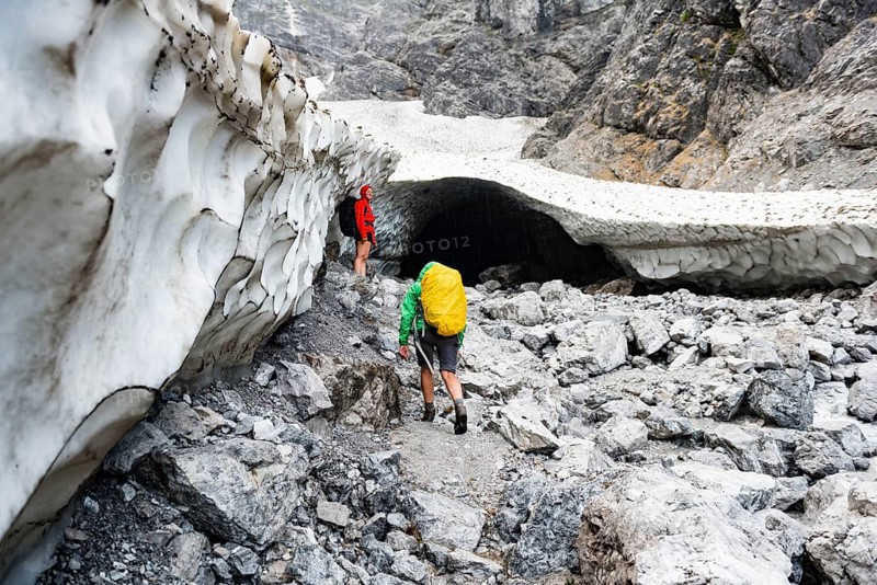 Two hikers at the ice chapel