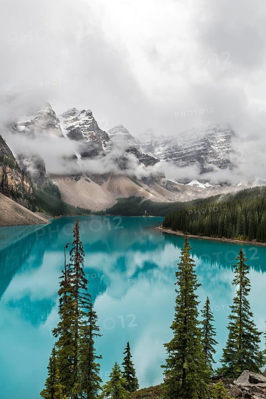 Clouds hanging between the mountain peaks