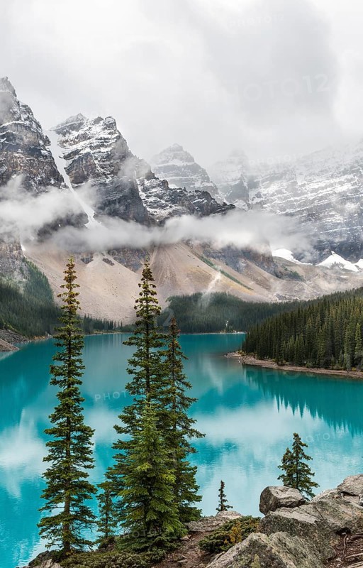 Clouds hanging between the mountain peaks