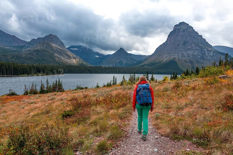 Woman walking on a hiking trail