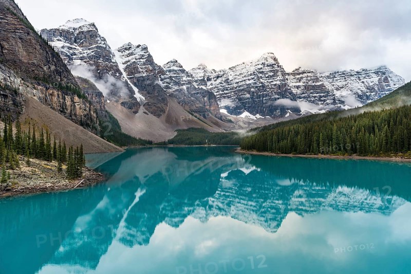 Clouds hanging between mountain peaks