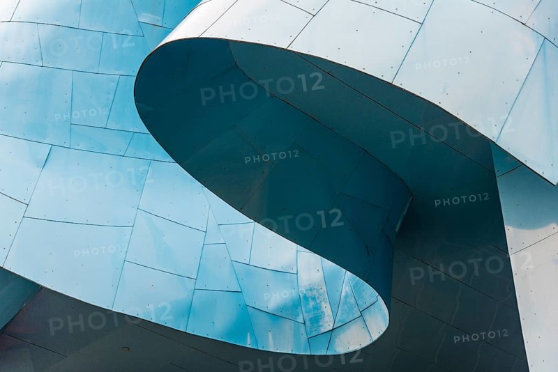 Curved colored facade of the Museum of Pop Culture