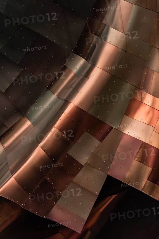 Copper coloured curved facade of the Museum of Pop Culture