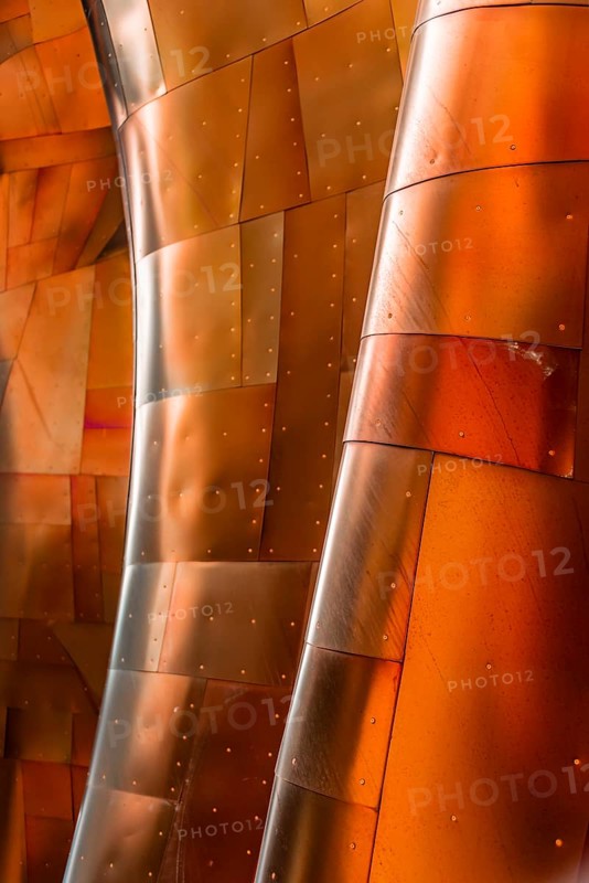 Copper coloured curved facade of the Museum of Pop Culture
