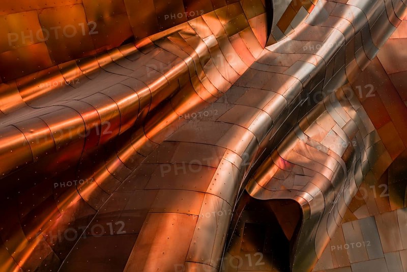 Copper coloured curved facade of the Museum of Pop Culture