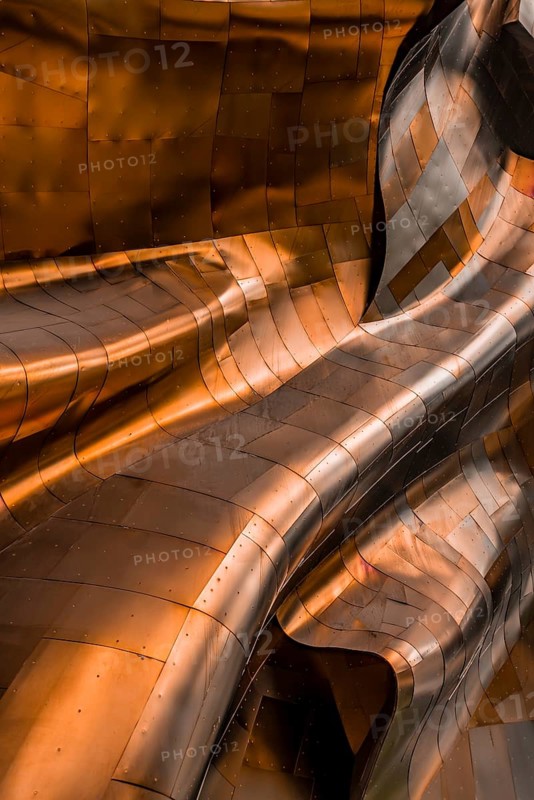 Copper coloured curved facade of the Museum of Pop Culture