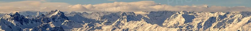 Panorama of the snow-covered Alpine range in winter