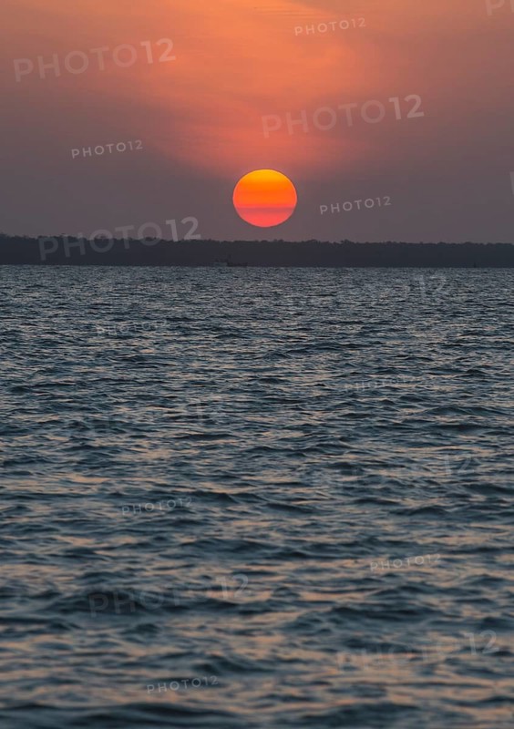 Sunset over the Suriname river near Paramaribo