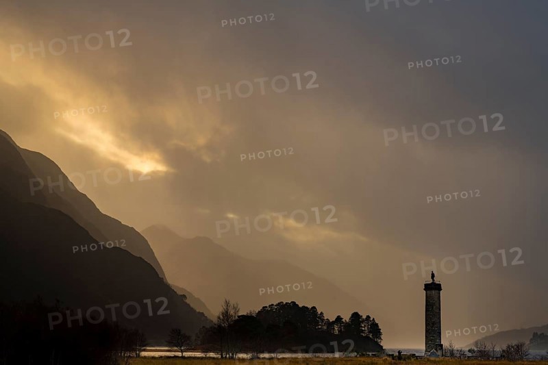 Loch Shiel with Glenfinnan Monument under threatening cloudy sky